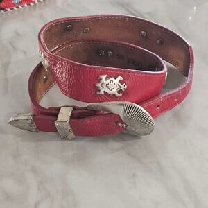 Crimson red thick leather belt with etched buckle, symbolic animal medallions